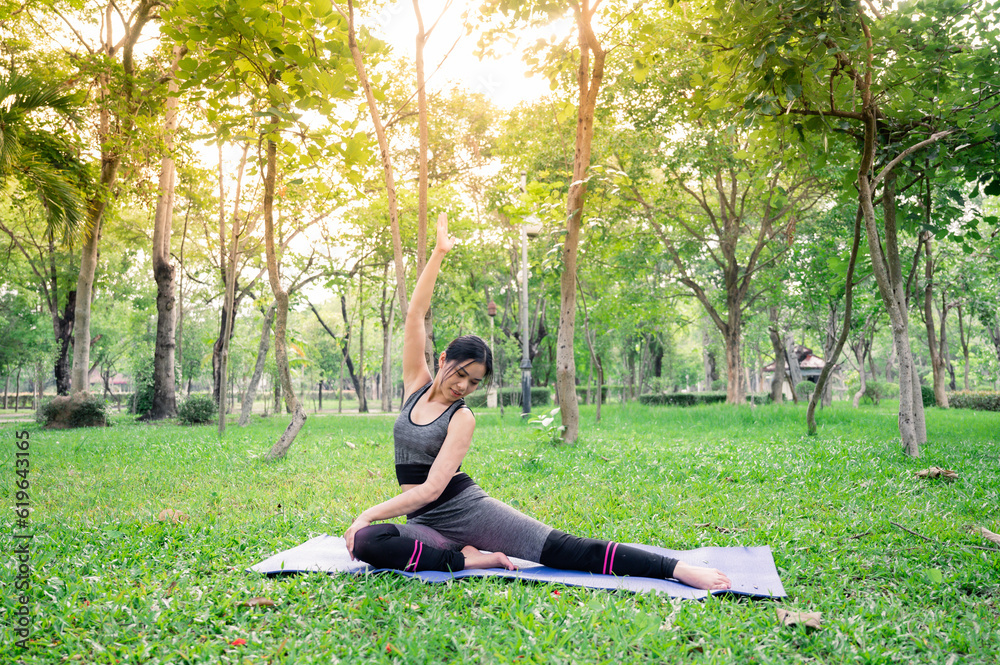 Yogaing in the park under sunset Yogaing in the park under sunset