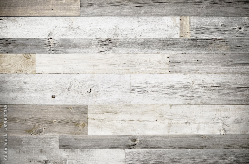 Dark stained reclaimed wood surface with aged boards lined up. Wooden