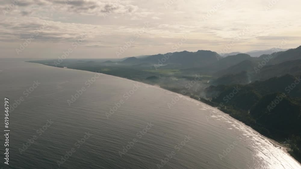Aerial drone of coast during sunrise covered with fog. Sumatra, Indonesia. Aerial drone of coast during sunrise covered with fog. Sumatra, Indonesia.
