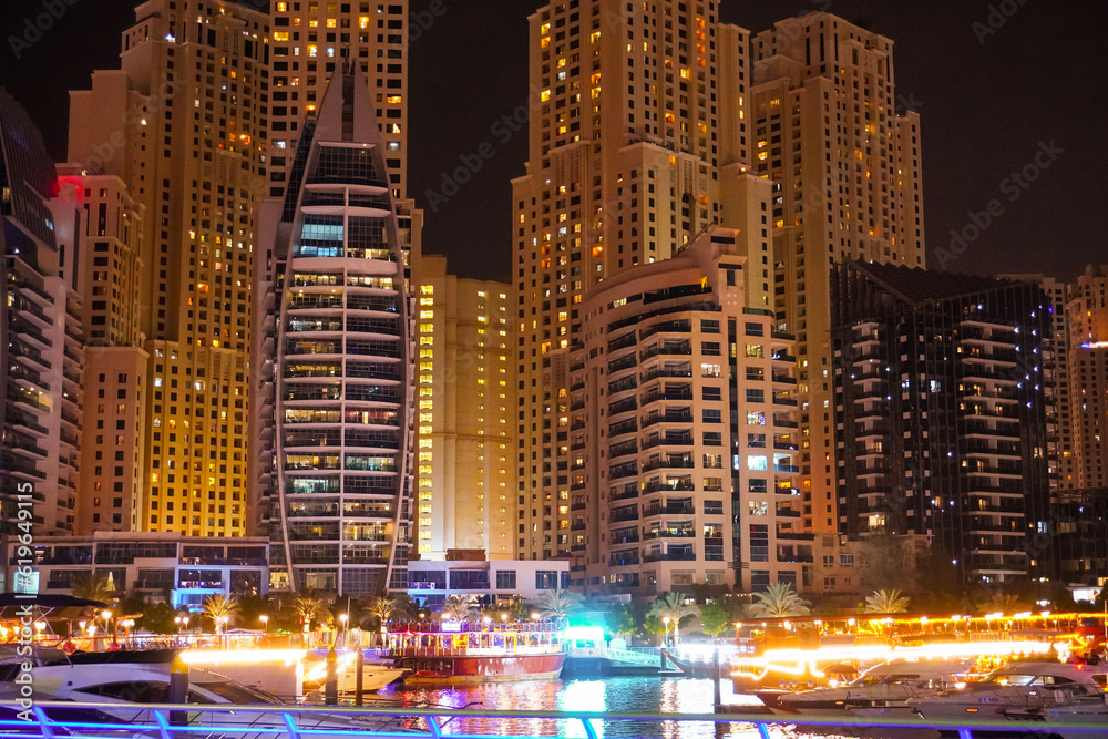 Dubai Marina in Dubai, UAE. View of the skyscrapers and the canal, view at night