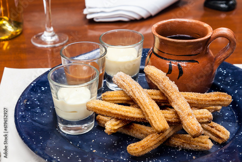 Mexican Churros with dipping sauces and coffee