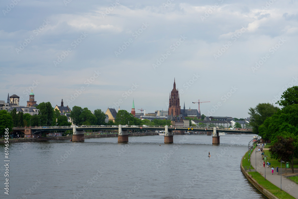 10.05.2022 Frankfurt am Main, Germany. Image of Frankfurt skyline during sunset. Germany- Hesse- Frankfurt- Ignatz Bubis Bridge at dusk with downtown skyline. Banks EZB European Central Bank. 10.05.2022 Frankfurt am Main, Germany. Image of Frankfurt skyline during sunset. Germany- Hesse- Frankfurt- Ignatz Bubis Bridge at dusk with downtown skyline. Banks EZB European Central Bank.