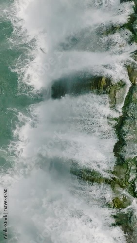 Aerial view of Beautiful Tinuy-an Falls. Bislig, Surigao del Sur. Mindanao, Philippines. Slow Motion. Vertical. photo