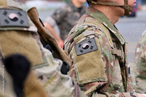 Fotografie Taegeukgi South Korea Flag attached to the KATUSA US army military uniform