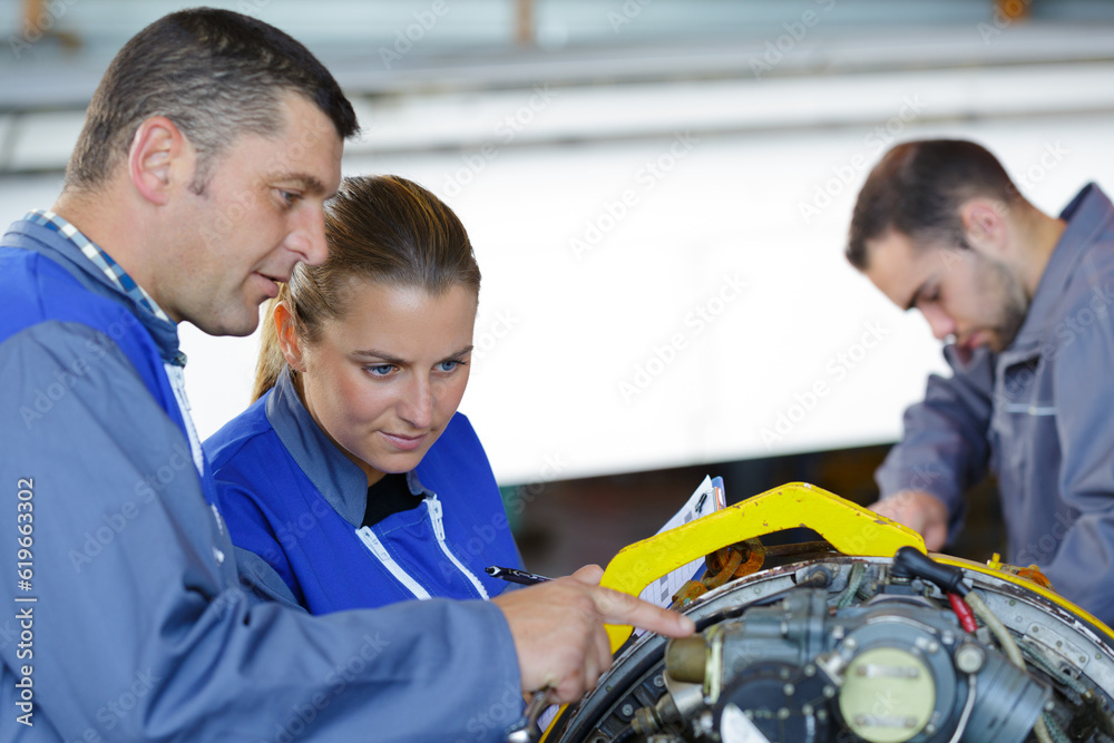 an engineer training female apprentice an engineer training female apprentice