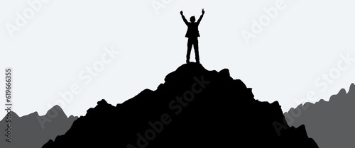 Successful conceptual photo illustrator,silhouette business man stand on top of mountain.