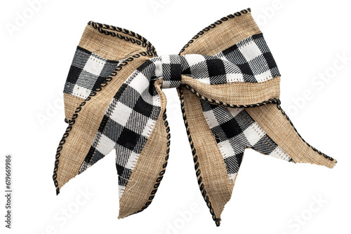 Obraz na płótnie Vintage Burlap Ribbon Bow Isolated on White Background With Clipping Path Cutout Concept for Rustic Christmas Decoration, Artistic Gift Packaging, and Isolated Design Elements w salonie