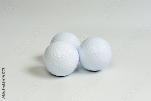 white golf ball isolated in white background