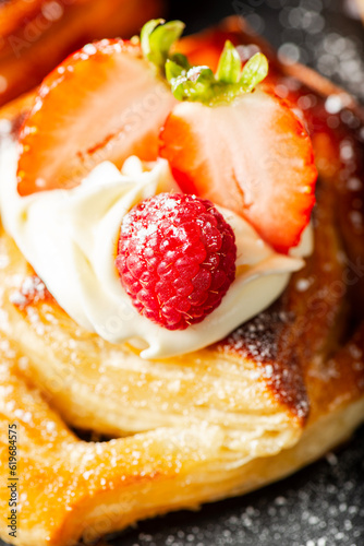 Delicious flaky fresh baked Danish Pastry with Chantilly cream and fresh fruit.