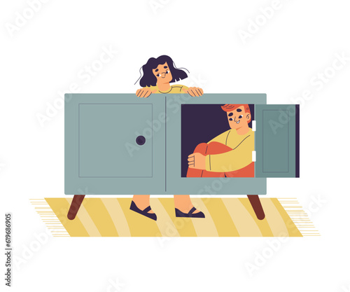Little Boy and Girl Playing Hide and Seek Game Sitting in Cupboard Vector Illustration