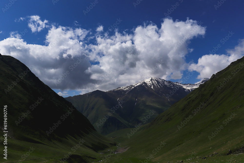 Caucasus mountain landscape with clouds, Georgia