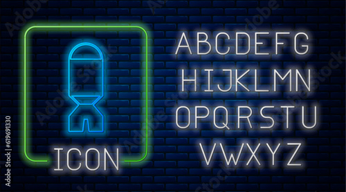 Glowing neon Rocket launcher with missile icon isolated on brick wall background. Neon light alphabet. Vector
