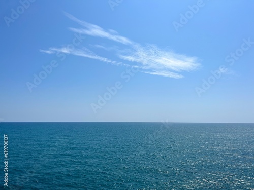 Sea blue glittering water clear sky horizon seascape. 