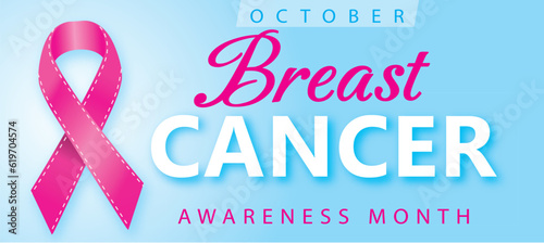 Pink ribbon – Symbol of the fight against breast cancer against a background of blue sky with month