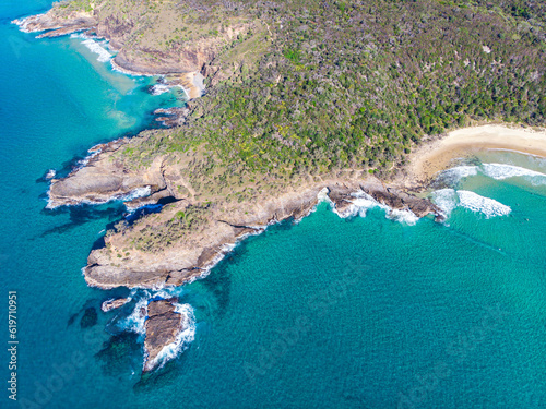 aerial panorama of beautiful coast of noosa national park; unique sandy beaches, cliffs and little bays with turquoise water near sunshine coast in south east queensland, australia 