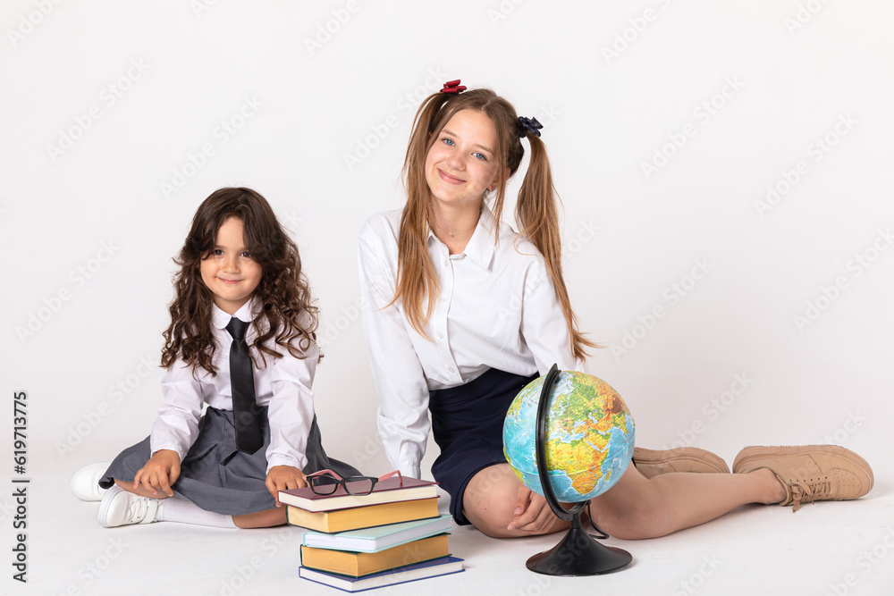 Portrait of Schoolgirls on white background. Back to school concept Portrait of Schoolgirls on white background. Back to school concept