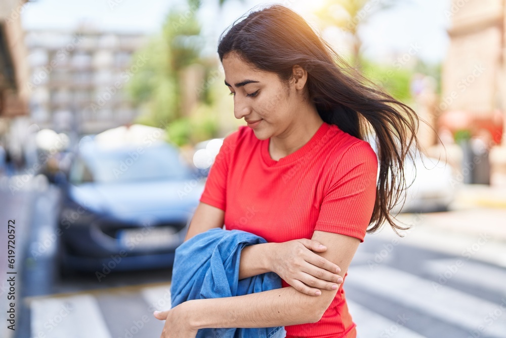 Young hispanic girl smiling confident standing at street Young hispanic girl smiling confident standing at street