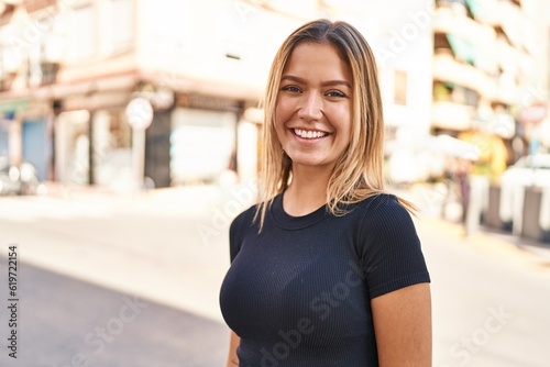 Young hispanic woman smiling confident standing at street Free Download Young hispanic woman smiling confident standing at street - GFXLoad