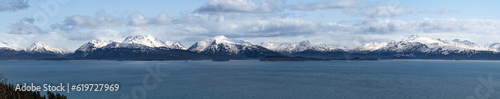 Panorama of the mountains of Lake Clark National Park and Preserve from the Kenai Peninsular across the Cook Inlet.
