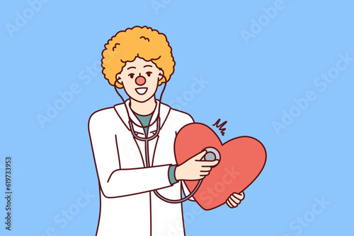 Doctor with clown haircut holds stethoscope and big heart in hand to congratulate children on red nose day. Funny doctor pediatrician calls to draw on cardiovascular diseases and undergo diagnostics