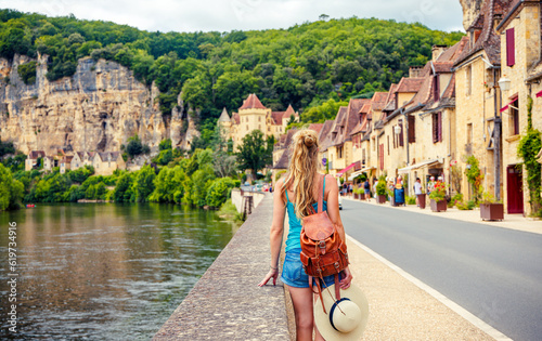 Woman traveling in Europa- Beynac et Cazenac in France- Dordogne photo