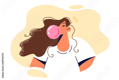 Girl blows chewing gum bubble enjoying fruity pink cud due to laziness and lack of urgent matters