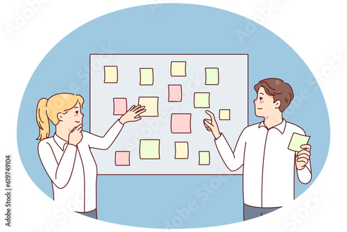 Employees brainstorm engaged in creative thinking in office. Businesspeople work with sticker planning tasks together at meeting. Teamwork concept. Vector illustration.
