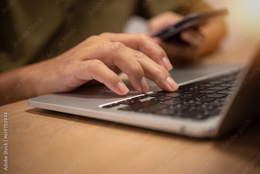 Businessman using laptop computer for working internet online research Information and data analysis. Technology and innovation and growth concept Businessman using laptop computer for working internet online research Information and data analysis. Technology and innovation and growth concept