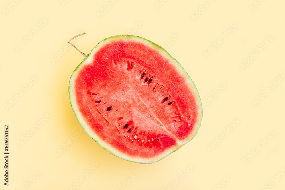 Watermelon fruit sliced half isolated on yellow background, Organic fruit, Ripe watermelon Watermelon fruit sliced half isolated on yellow background, Organic fruit, Ripe watermelon