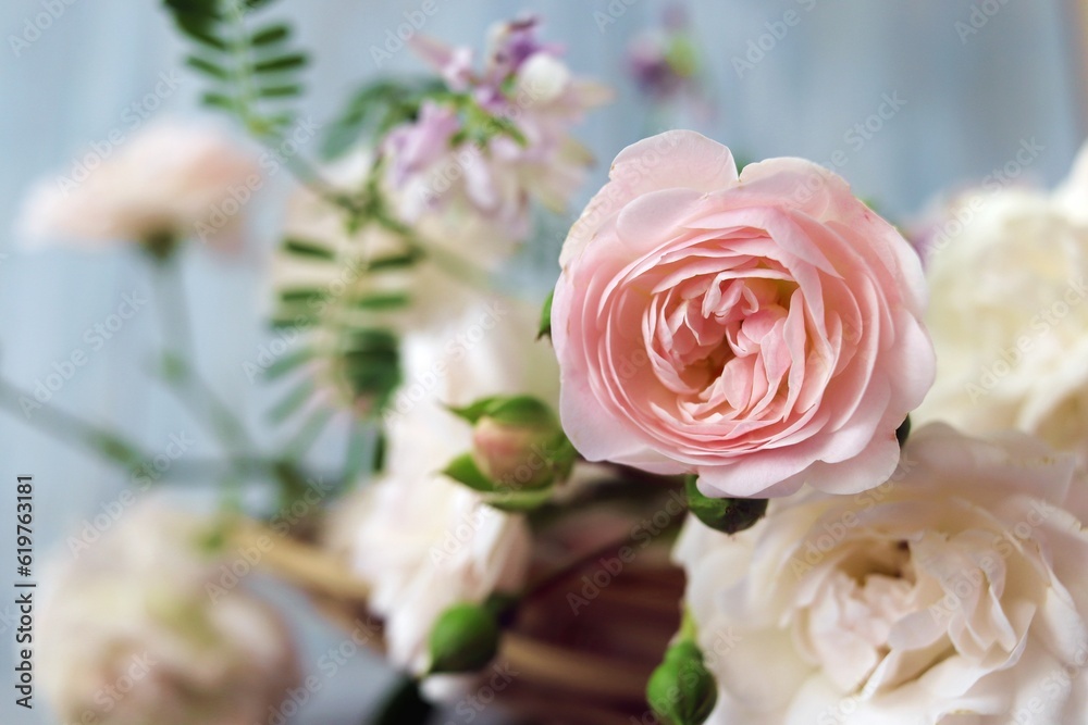 Bouquet of roses for a wedding bouquet, fresh flowers, blurred background Bouquet of roses for a wedding bouquet, fresh flowers, blurred background
