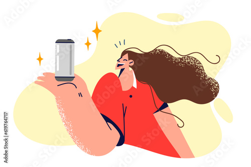 Woman with can of soda smiles, rejoicing at opportunity to quench thirst with cold tasty drink