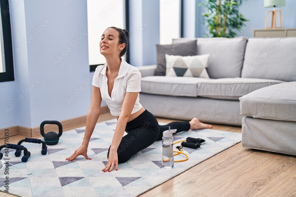 Young caucasian woman smiling confident stretching legs at home Young caucasian woman smiling confident stretching legs at home