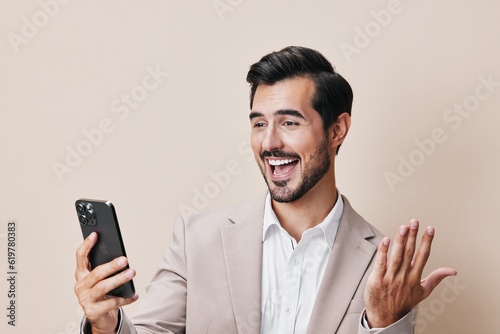 man smartphone happy portrait hold suit call phone smile confident business