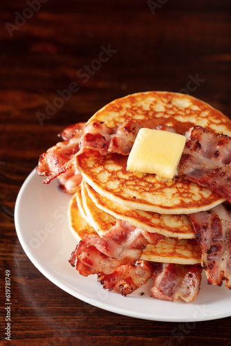 Obraz na płótnie sweet pancakes with butter and bacon. traditional american breakfast w salonie