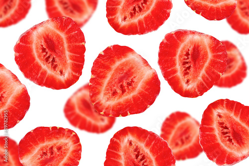Levitation of strawberry halves isolated on a transparent background.
