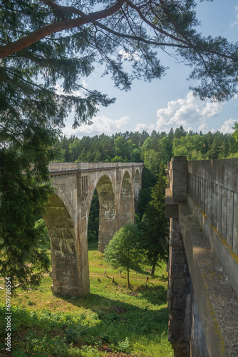Fototapeta Naklejka Na Ścianę i Meble -  Old concrete railway bridge in Stanczyki, Mazury, Poland