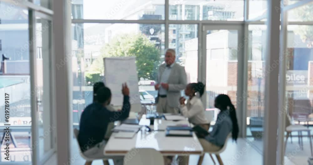 Presentation, meeting and mature businessman talking to corporate team with questions in the boardroom. Discussion, blur and professional male manager presenting to group of colleagues in the office.