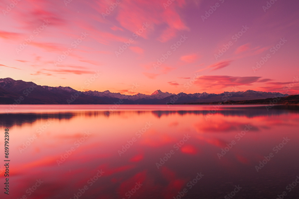 A view over Lake Tekapo at sunset looking towards Mount Cook 