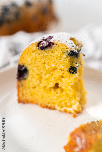 Lemon blueberry bundt cake with powdered sugar dusting