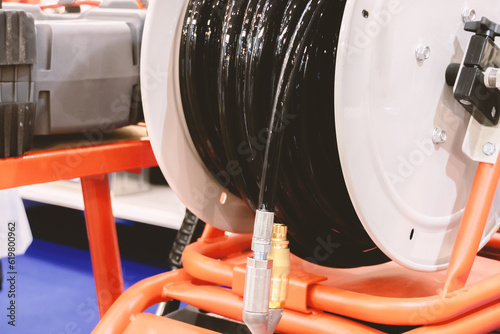 Equipment for cleaning and unblocking main and domestic sewer pipes with a high pressure hose.