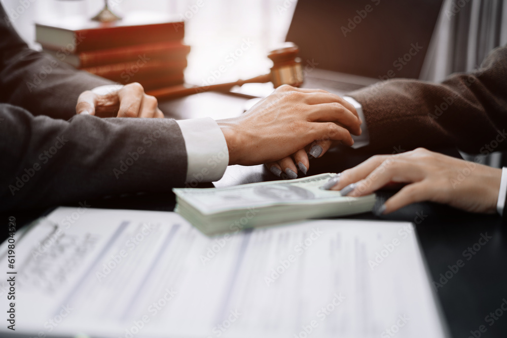 Obraz premium Lawyer accepts money, bribes businessman for partner in corruption in workplace.