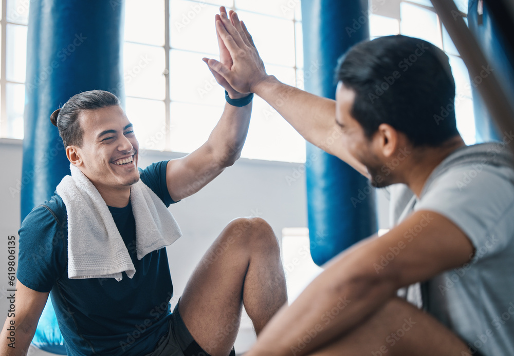 Fitness, high five and men friends at a gym for training, workout and motivation, happy and smile. Exercise, success and man with personal trainer at health club celebrate kickboxing goal or progress