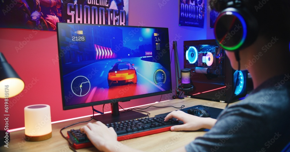 Little Boy Playing Car Game On Computer At Home Stock Photo