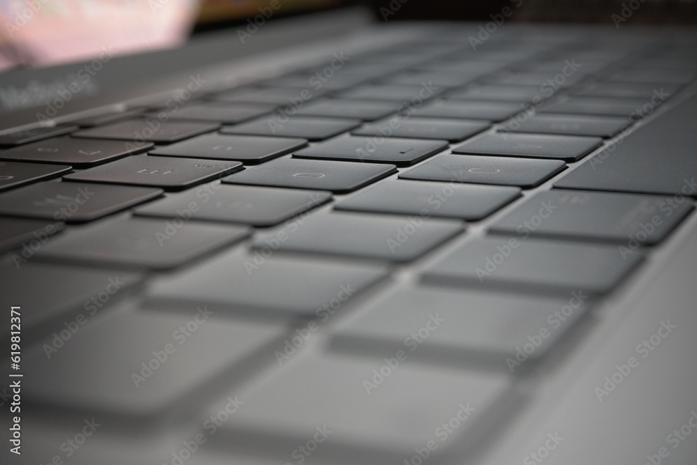 Close-up of the notebook keyboard on black and
space gray Close-up of the notebook keyboard on black and
space gray