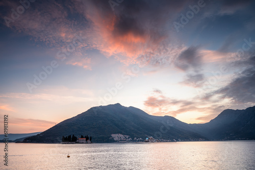 Panoramic view of the picturesque cliffs of the Bay of Kotor near the beautiful town of Perast and islands during the golden hour of sunset  Montenegro.