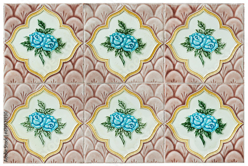 Rows of antique Nyonya Tiles with blue roses with brown background. Vintage wall tile in penang.