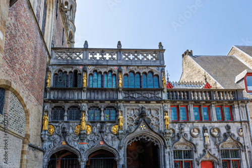 Facade of Basilica of the Holy Blood in Bruges, Belgium, a Roman Catholic basilica that houses a relic of the Holy Blood allegedly collected by Joseph of Arimathea. photo