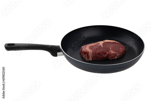 Wallpaper Mural Raw steak in a pan on a white background. Raw piece of beef close-up in a frying pan isolated on white background. Torontodigital.ca