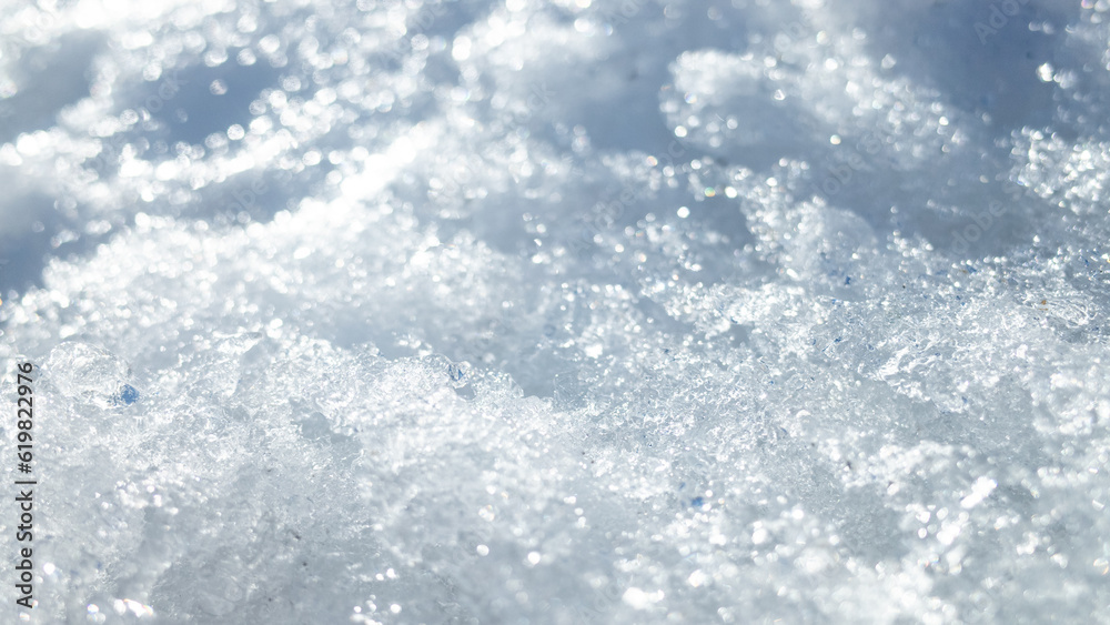 Close-up of snow ice, with intricate patterns and textures. The crisp and clear captures the icy beauty of winter and the natural frozen Close-up of snow ice, with intricate patterns and textures. The crisp and clear captures the icy beauty of winter and the natural frozen