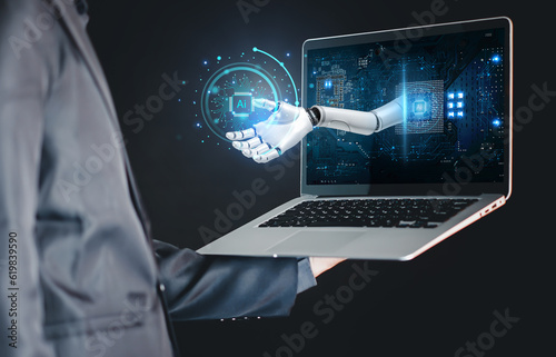 Technology and people concept man use AI to help work, AI Learning and Artificial Intelligence Concept. Business, modern technology, internet and networking concept. AI technology in everyday life.
